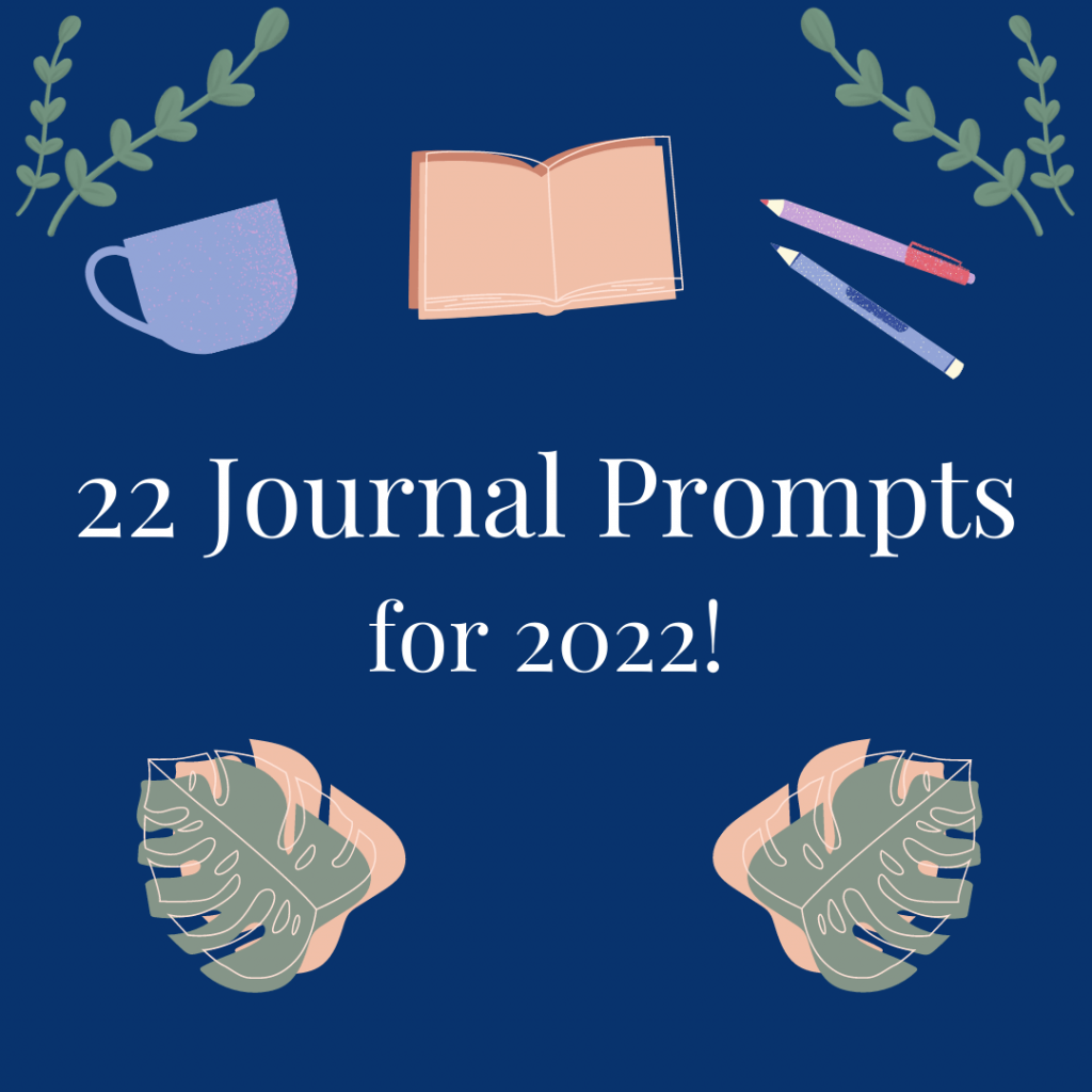 "22 Journal Prompts for 2022!" written in white text against a dark blue background. Surrounding the text are images of a purple cup with a handle, an open book, two pens, and green leaves