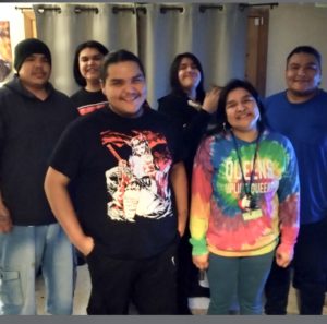 Jennifer Goggleye's six children standing next to each other and smiling