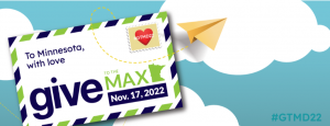 Blue background with white clouds, one of which displays the AmazeWorks logo. A white envelope reads, "To Minnesota with love: Give to the Max Nov. 17, 2022" with a heart stamp in the top right corner. A paper airplane flies around the sky. "#GTMD22" is written in the bottom right corner