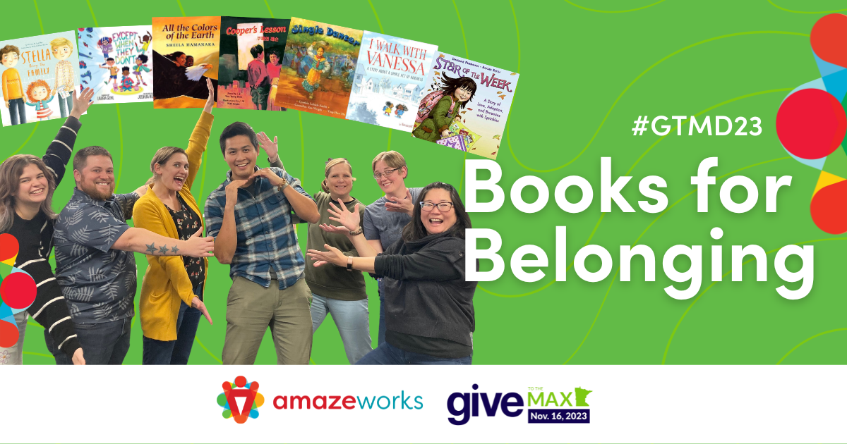 AmazeWorks staff posing with our arms gesturing outward, toward our photoshopped #BooksForBelonging picks of different AmazeWorks picture books. White text reads, "Books for Belonging; #GTMD23"