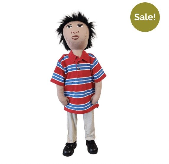 Persona Doll Daniel wearing a red, blue, and white striped shirt; khaki pants; and black sneakers. SALE sticker in upper righthand corner.