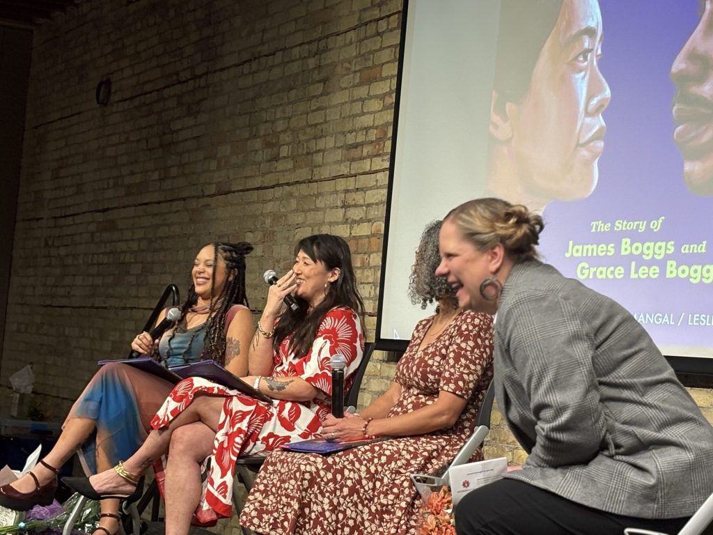 Authors Sun Yung Shin and Mélina Mangal, illustrator Leslie Barlow, and AmazeWorks' Mel Andersen laugh on stage during the Revolutions Are Made of Love book launch Q&A
